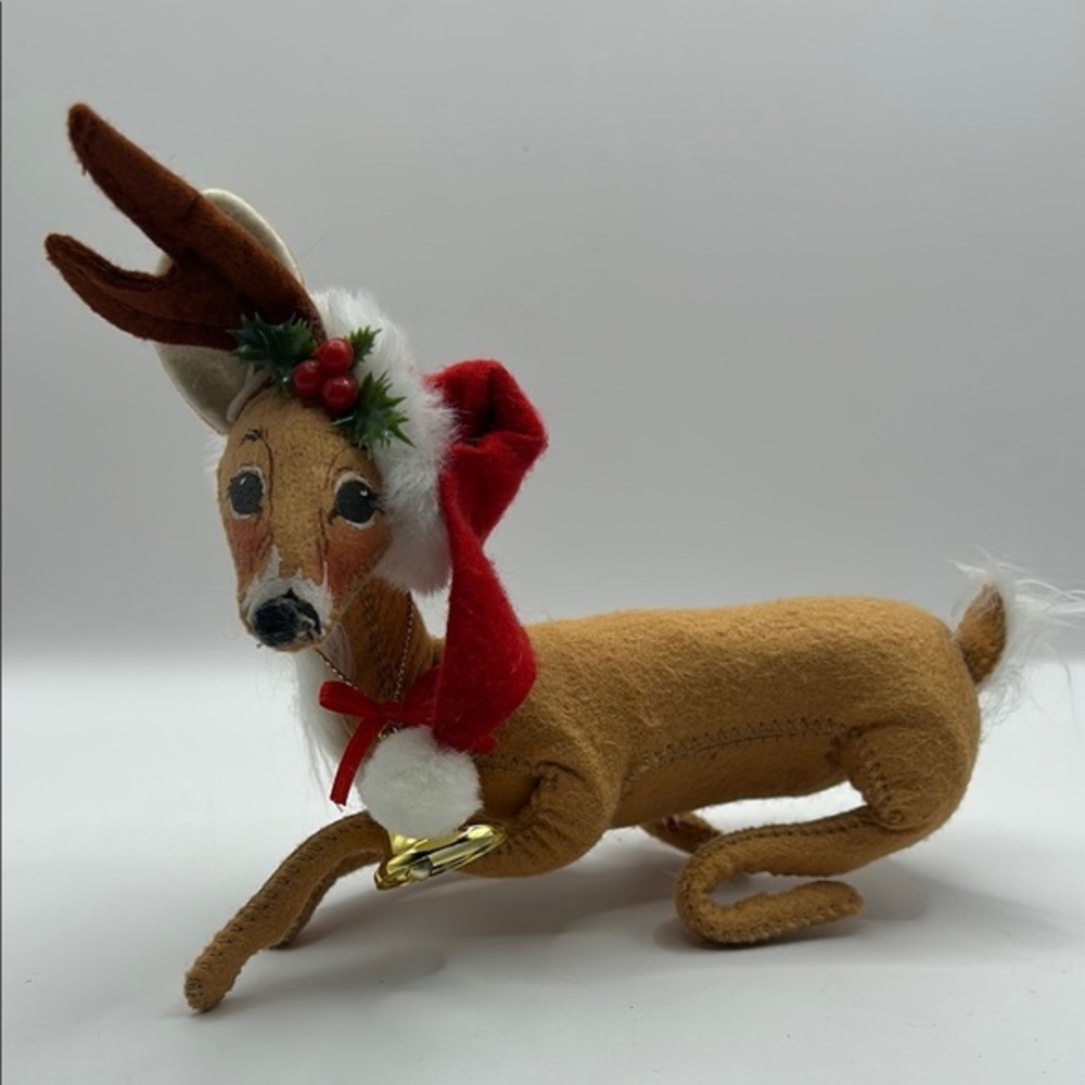 Annalee Reindeer wearing a Santa hat and bell